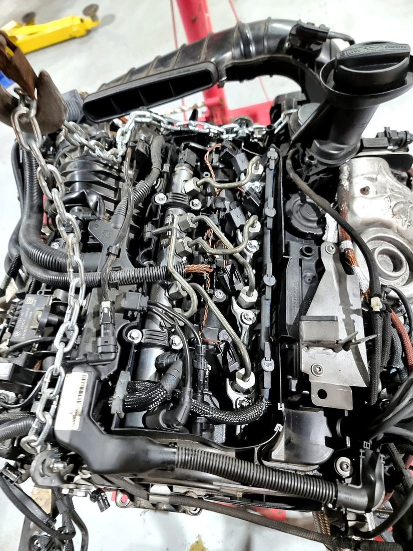 Engine removed from vehicle during a full overhaul