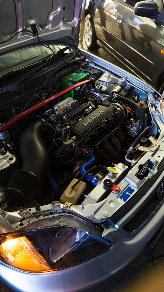 Engine bay of a used car during a pre-purchase inspection